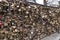 Lots of padlocks on a grid mesh fence at the Sacre-Coeur Basilica in Paris, France