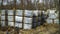 Lots of paving stones stacks are stored on ground on construction site