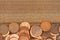 Lots of pennies money background with weathered wood