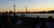 Lots of people enjoy sunset at Rheintreppe in Duesseldorf with a wonderful view onto the majestic Rhein River