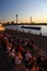 Lots of people enjoy sunset at Rheintreppe in Duesseldorf with a wonderful view onto the majestic Rhein River