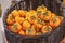 Lots of persimmon in basket at bazaar. agriculture farm full of organic vegetables. Pile of ripe persimmon in the store.