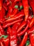 Lots of red hot spice peppers for eating like a background