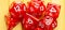 Lots of red RPG game dice extreme closeup wide shot, banner. Role playing board games symbol, simple polyhedral dice set scattered