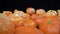 Lots of ripe tangerines shot in extreme detailed macro. On a black background