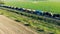 Lots of tank wagons with oil, gas, fuel on a railway, top view.