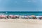 Lots of tourists spending their vacation and lots of umbrellas at the beach of Tel Aviv, Israel in summertime