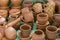 Lots of traditional ukrainian handmade clay pottery production. brown pottery. Clay plates and cups