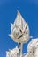 Lotus with blue sky of Wat Rong Khun temple in Chiang Rai,Thailand