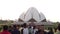 Lotus Temple in Delhi. Many people on the background of the famous Indian Lotus Temple