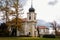 Loucen Rococo castle surrounded by a vast English park, Romantic baroque chateau with Church of the Assumption of the Virgin Mary