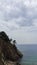 Ð¡louds above the sea cliff. Costa Brava
