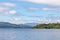 Lough Corrib with forest and Conerama mountains in background