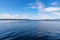 Lough Corrib with forest and Conerama mountains in background