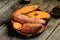 Louisiana Beauregard Sweet Potatoes, Organic orange sweet potato or batatas. vegan food ingredient. banner, menu, recipe place for