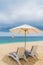 Lounge chairs on a beautiful sandy tropical beach