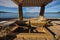 Lounge chairs in a cabana at beach