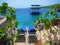 Lounge chairs overlooking the caribbean sea and swim platform