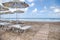 Loungers and beach umbrellas on a sandy beach