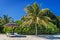 Loungers and umbrella on tropical beach in Mauritius Island