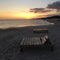 Lounges the beach at Sunset on the Gulf Shore