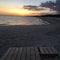 Lounges the beach at Sunset on the Gulf Shore