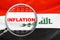 Loupe focused on the word inflation on Iraq flag background. Inflation, tax, financial concept in Iraq