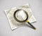 Loupe magnifying glass tool with streets paper map