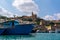 Lourdes Chapel with nose of blue boat in the foreground