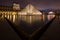 The Louvre Museum at Night in Paris, France