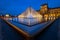 The Louvre Museum at Night in Paris, France