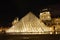 Louvre museum in Paris at night