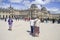 Louvre Museum and Place du Carrousel with lots of visitors