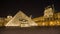 The Louvre of Paris in France by night