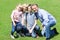 Lovable family posing in the park