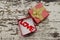 Love alphabet in gift box on grunge wood background