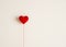Love background, hand holding red heart knitting shape