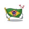 In love brazil flag hoisted on character pole