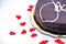 Love chocolate: sacher torte on white with red hearts