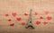 Love concept with Eiffel tower and heart shaped icons