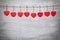 Love concept. Hearts hanging on a string