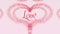 Love confession. Valentine`s Day heart made of pink splash is appearing. Then comes the lettering. The heart is