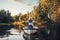 Love couple in boat on quiet lake, daydream