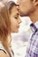 Love, couple and forehead kiss, park and happiness for relationship, dating and quality time outdoor. Romance, man and