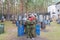 Love couple posing with paintball markers outdoors