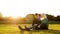 Love couple sitting on grass in summer park