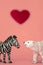 Love between the different and opposed: a bear, carnivorous from a cold habitat and a zebra, herbivorous from a hot habitat