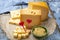 Love Dutch cheese concept, blocks of young and aged Gouda hard cheese