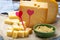 Love Dutch cheese concept, blocks of young and aged Gouda hard cheese