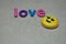 In love emoji with the word love